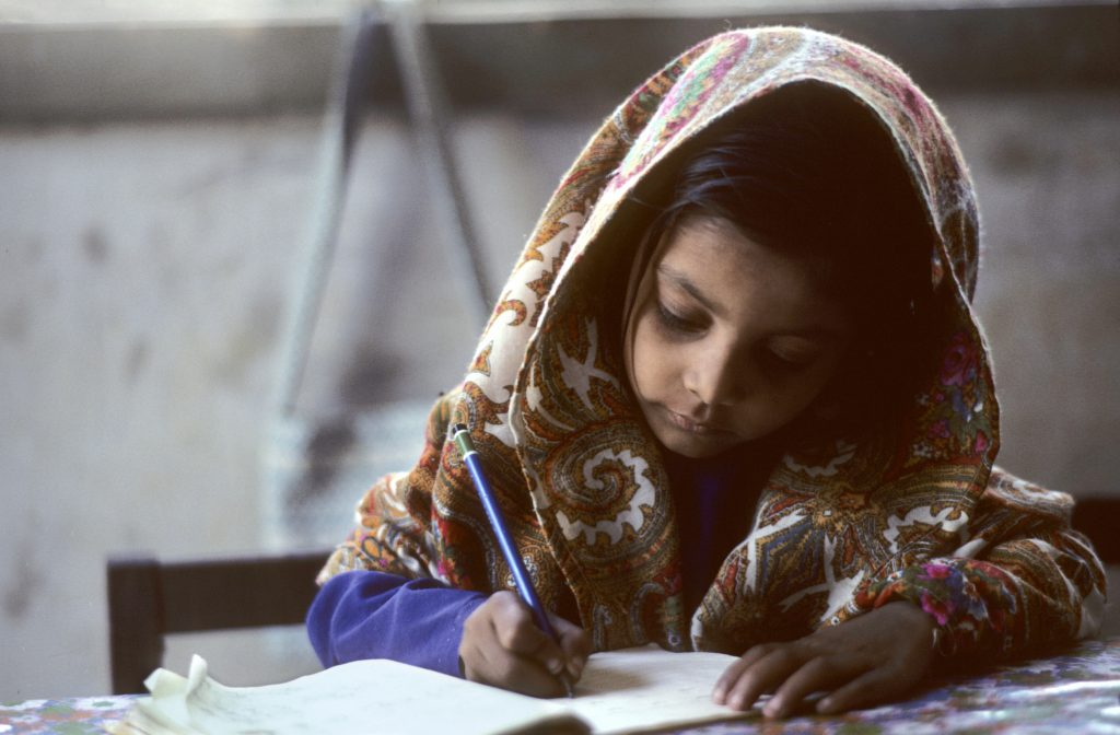 Portrait of Pakistani Schoolgirl by UN Photo/John Isaac is licensed under CC BY-NC 2.0